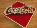 quadro coca cola 3d realizzato con 600 viti - coke photo