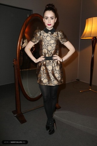  Lily attends the Louis Vuitton Fall/Winter toon during Paris Fashion Week [06/03/13]