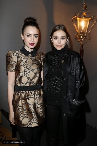  Lily attends the Louis Vuitton Fall/Winter tampil during Paris Fashion Week [06/03/13]