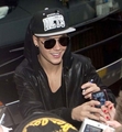 [April 11] Greeting fans outside his hotel in Antwerp, Belgium - beliebers photo