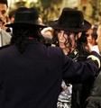 Michael with a fan - michael-jackson photo