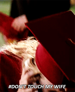 In which Klaus chops off peoples heads with a graduation cap that hurt Caroline.