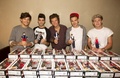 1d signing their dolls - one-direction photo