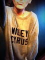 Miley wearing her own named t-shirt - miley-cyrus photo