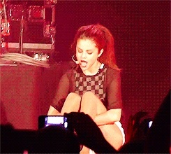 Selena performing on her Stars Dance Tour (Paris)