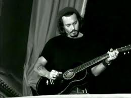 Johnny Depp playing/holding the gitaar