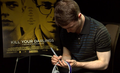 Signing Monster Canada headphones for charity (Fb.com/DanielRadcliffefanclub) - daniel-radcliffe photo