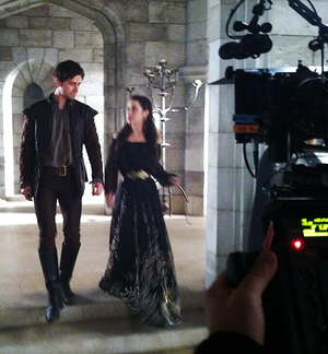 Adelaide Kane and Torrance Cooms on set