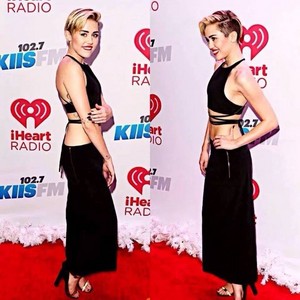  Miley wearing black two piece outfit