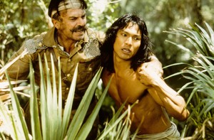  Colonel Geoffrey Brydon (Sam Neill) and Mowgli (Jason Scott Lee)