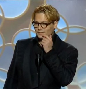  Johnny Depp presenting at the Golden Globes 2014