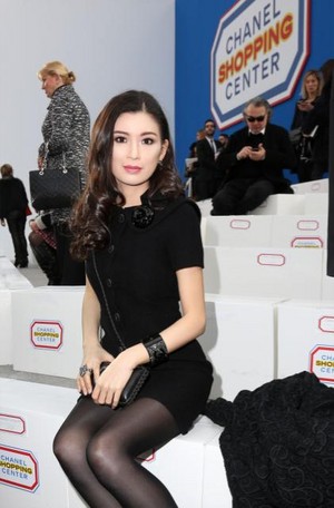 Rebecca Wang attends the 2014 Chanel Paris fashion show, Fall and Winter collection. 
