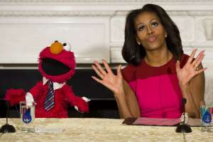 First Lady Michelle Obama And Elmo