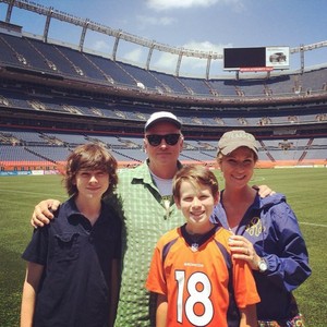  Chandler and his family at the Denver Broncos Stadium