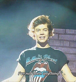 Harry reacting to a woman in the audience saying he was in trouble with her. (x)