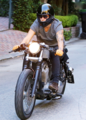 Harry riding his motorcycle in Brentwood - July 22, 2014  - one-direction photo