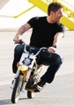 Jensen Riding a Small Motorcycle - jensen-ackles photo