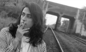 Rajkumar Patra smoking fashion in rail road photography 2014
