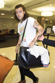                 Harry at the airport - harry-styles photo