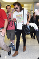                 Harry at the airport - harry-styles photo