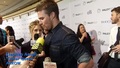 Emily giving Stephen jelly beans at PaleyFest 2015. - stephen-amell-and-emily-bett-rickards photo