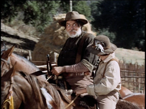 Jeff York as Bud Searcy and Kevin Corcoran as Arliss Coates in Savage Sam