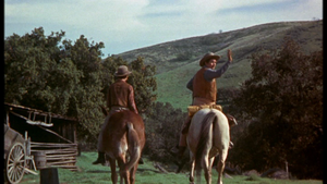  Tommy Kirk as Travis Coates and Fess Parker as Jim Coates in Old Yeller