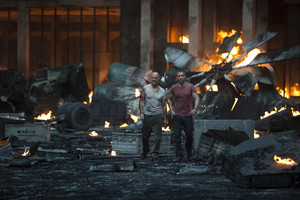 Bruce Willis as John McClane and Jai Courtney as Jack McClane in A Good Day to Die Hard