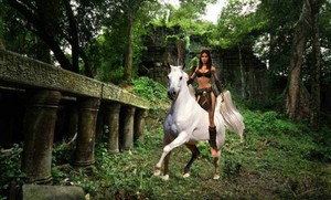 jungle girl exploring the ancient ruins while riding her beautiful white horse