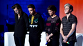 Moment of silence out of respect for the events in Paris at the start of the 1D London Session - one-direction photo