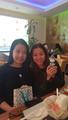 2 Maryland (USA) women wearing, holding Miss La Sen doll - random photo
