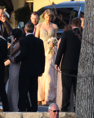 taylor swift as The Maid Of Honor at her friends wedding