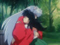 Inuyasha hugs Kagome - anime photo