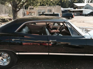  Jensen taking a nap in the Impala