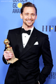 Tom and his Golden Globe Award - tom-hiddleston photo