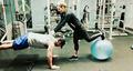 Stephen and Emily working out - stephen-amell-and-emily-bett-rickards photo