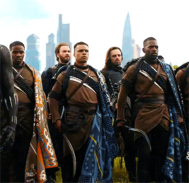  Bucky Barnes and Steve Rogers with Wakandan army