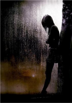 Sad girl in the rain