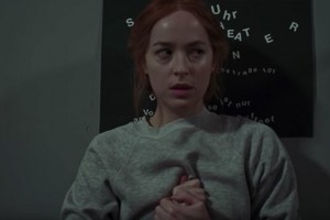 screen stills of Dakota in her creepy thriller,Suspiria
