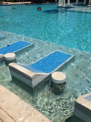  Pool With Built-in Lounge Chairs