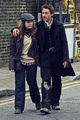 Robert Downey Jr and Susan Downey on set of Sherlock Holmes (2009) - robert-downey-jr photo