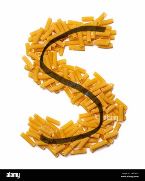  Letter S of the English alphabet from dry pastas, pasta on a white