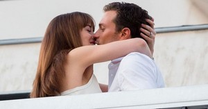 Christian and Ana kiss