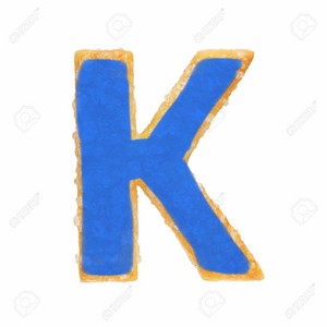 Letter K From Baked Dough Or Cookie
