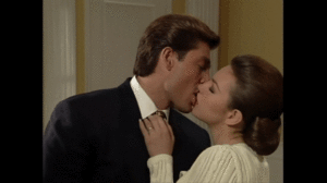 María and Luis Fernando kiss