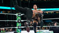  Roman Reigns spears The Rock | WrestleMania XL | April 6, 2024 - dwayne-the-rock-johnson photo