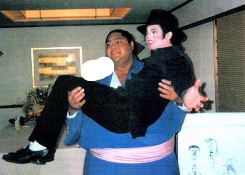  dose Michael have his hand on the man's shoulder?