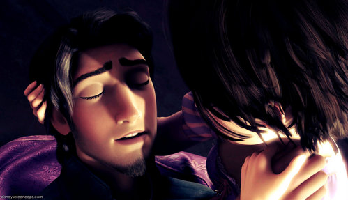  What does Eugene say to Rapunzel before he dies in her arms?