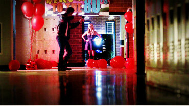  4x12 “A View to a Kill”, the sliding down the school hall, that Stefan shows to Rebekah, is a reference to which movie?