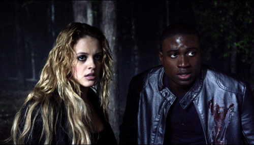 Who are Erica and Boyd looking at in this scene
